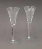 A pair of boxed Waterford crystal champagne flutes.