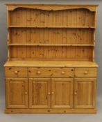 A modern pine dresser. 173.5 cm wide.