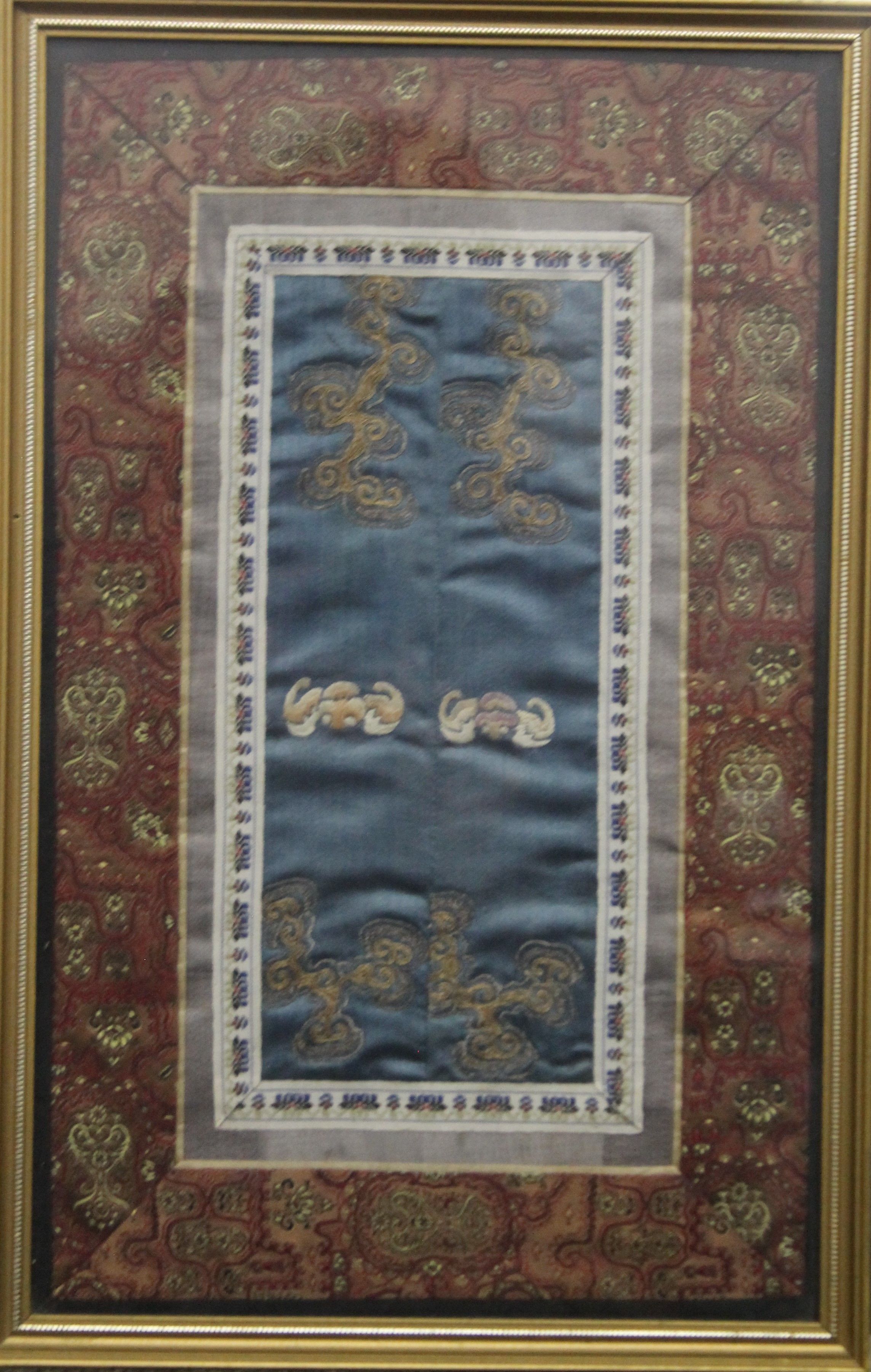 A Chinese embroidered sleeve panel, framed and glazed. 22 x 34 cm. - Image 2 of 2