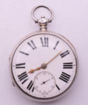 A gentleman's silver pocket watch, hallmarked for London 1874. 5 cm diameter.