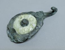 An Chinese archaic-style bronze and jade hook. 14.5 cm high.