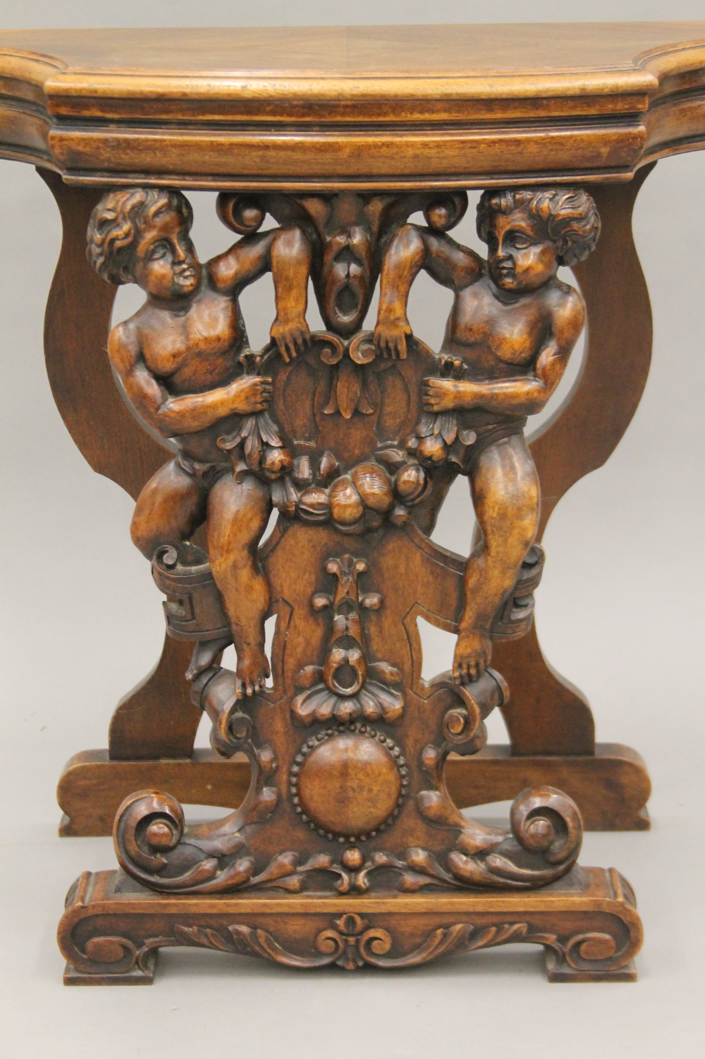 A 19th century carved walnut stool. 65.5 cm wide. - Image 4 of 5