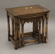 A nest of three oak tables. 50.5 cm wide.