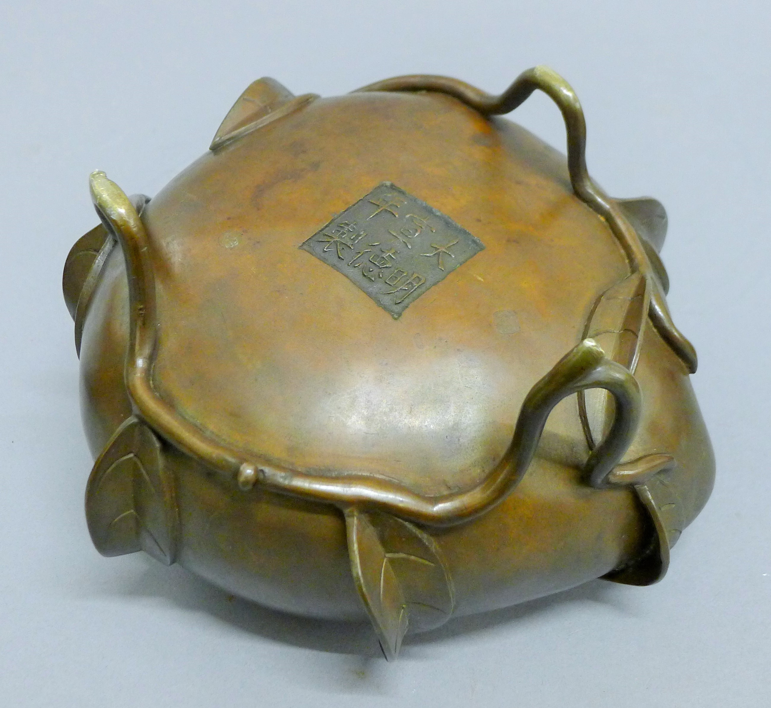 A 19th century Chinese bronze censer formed as a peach. 20 cm high. - Image 5 of 6