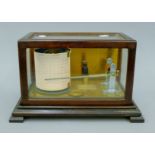 A brass bimetallic thermograph MK III MET REE No 1123 2917/63 by Wilson, Warden & Co Ltd of London.