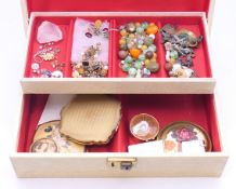 A quantity of jewellery, compacts, etc.