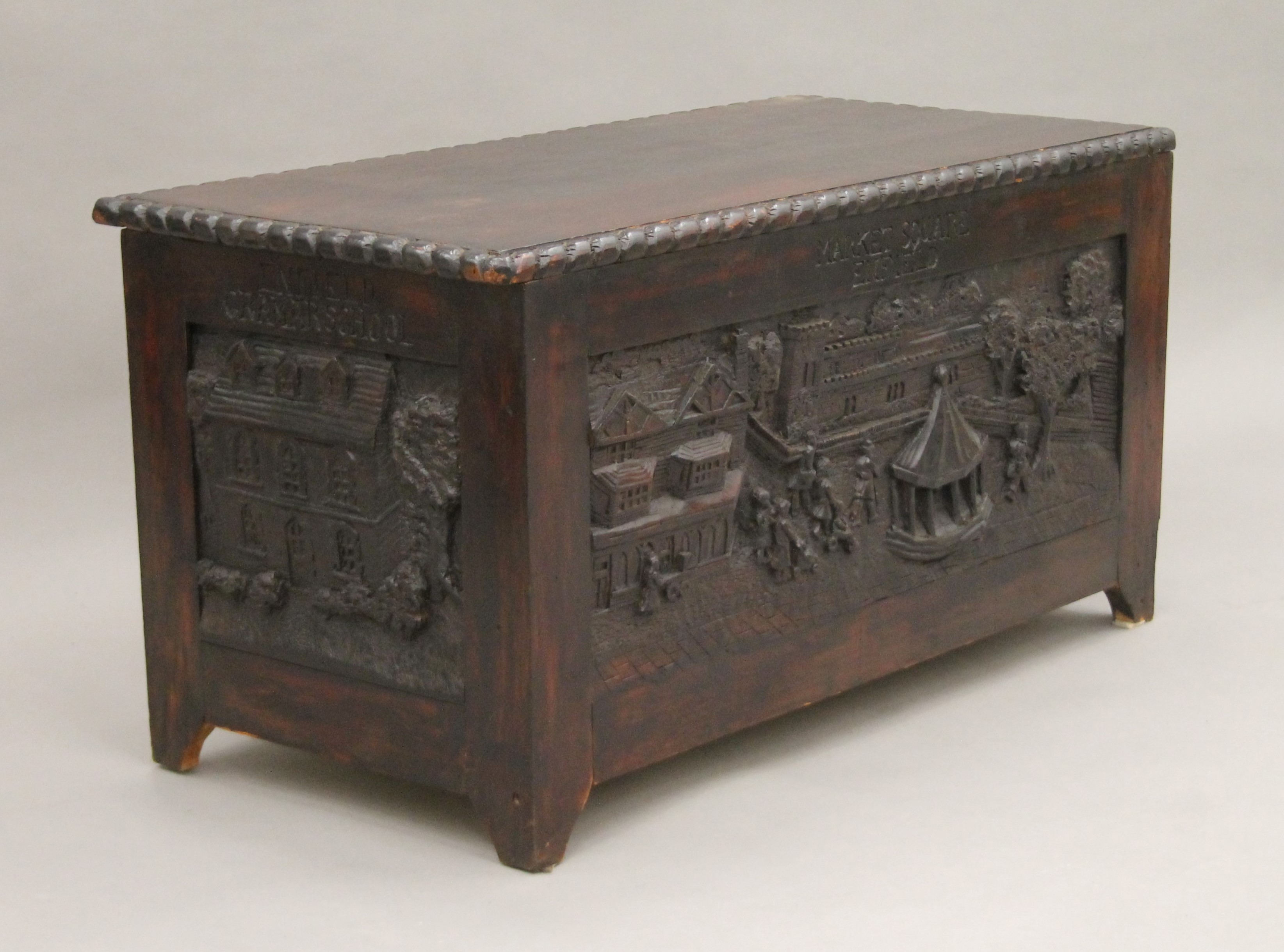 A trunk carved with scenes of Enfield. 88 cm long. - Image 3 of 7