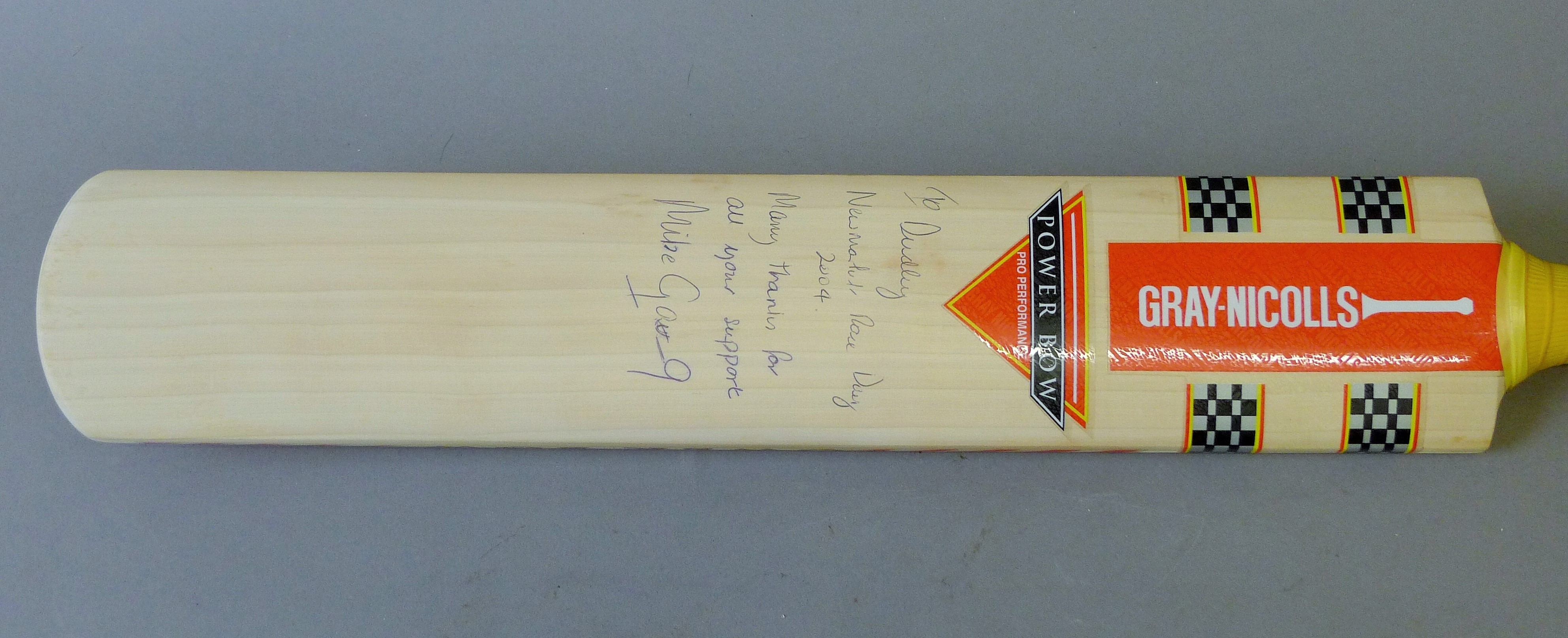 A Gray-Nicholls cricket bat with presentation inscription signed by Mike Gatting. 88 cms high. - Image 3 of 4