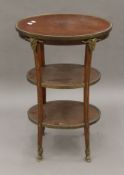 An Empire-style gilt brass mounted etagere. 49 cm wide.