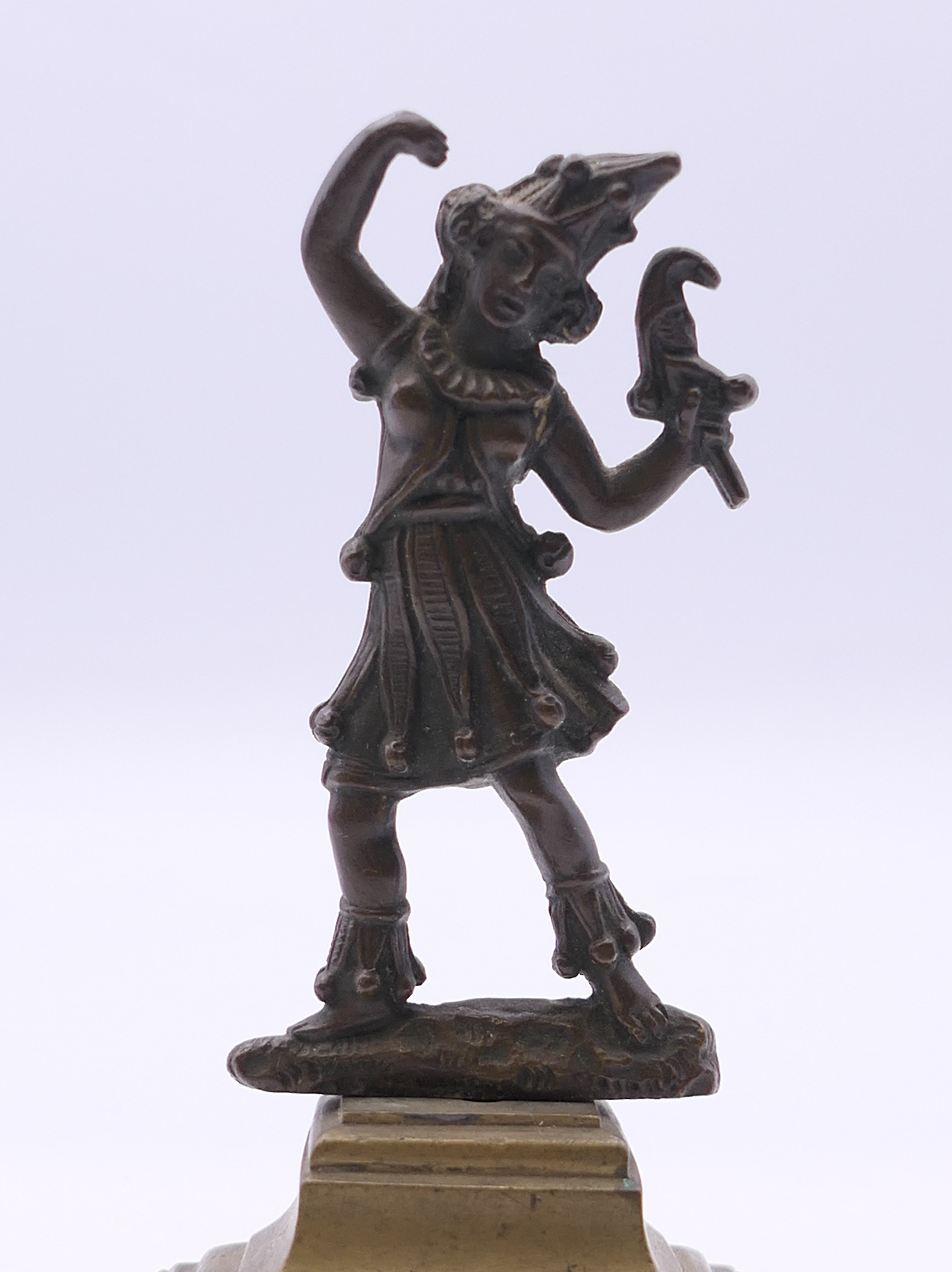 A 19th century bronze model of a jester mounted on a brass base. 10 cm high. - Image 2 of 3