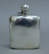 A silver spirit flask, hallmarks for Chester 1927, the front with presentation inscription. 8.