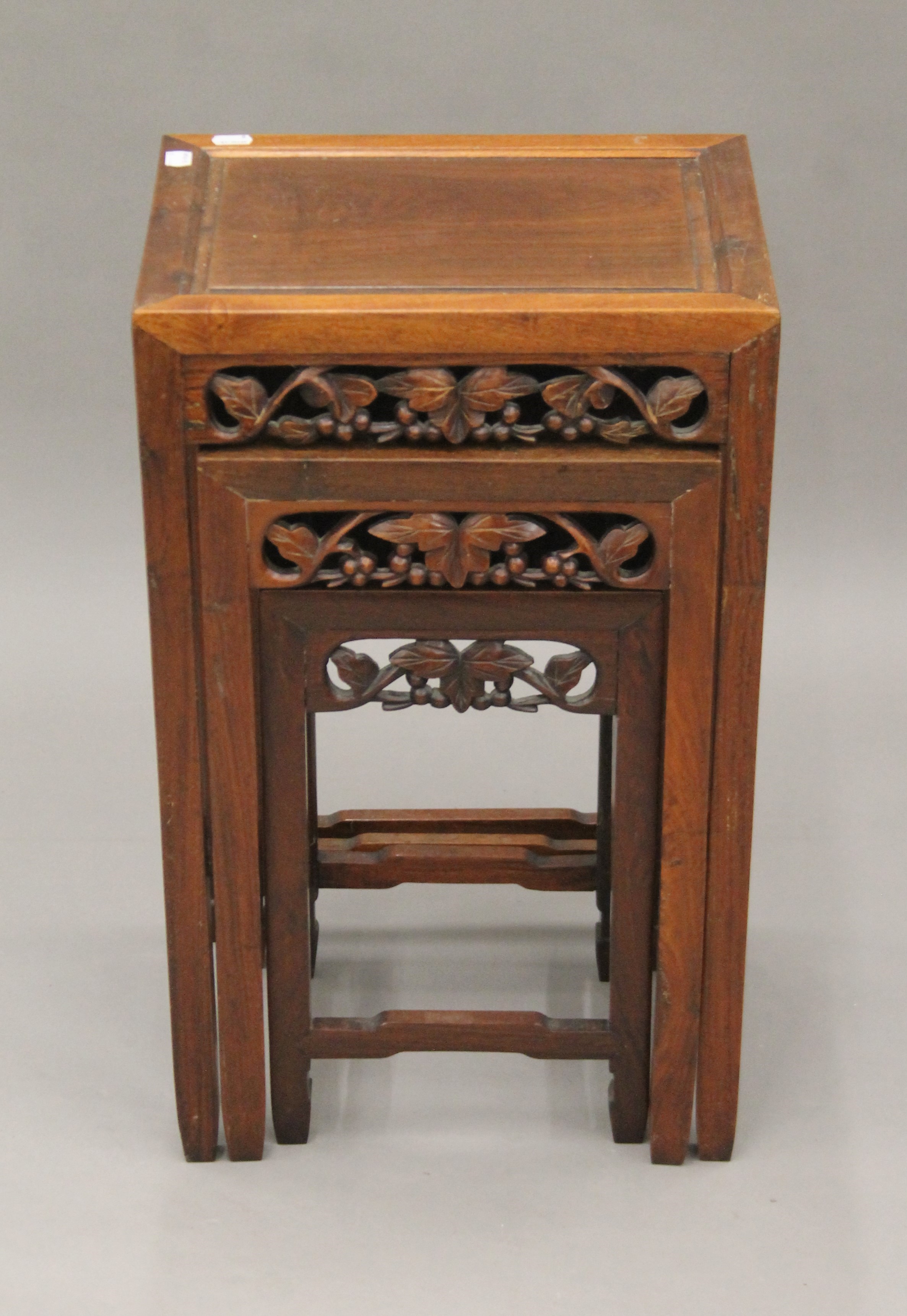 A nest of three Chinese hardwood tables probably late 19th or early 20th century. 38 cm wide.