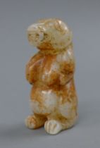 A russet jade dog-of-fo. 8.5 cm high.