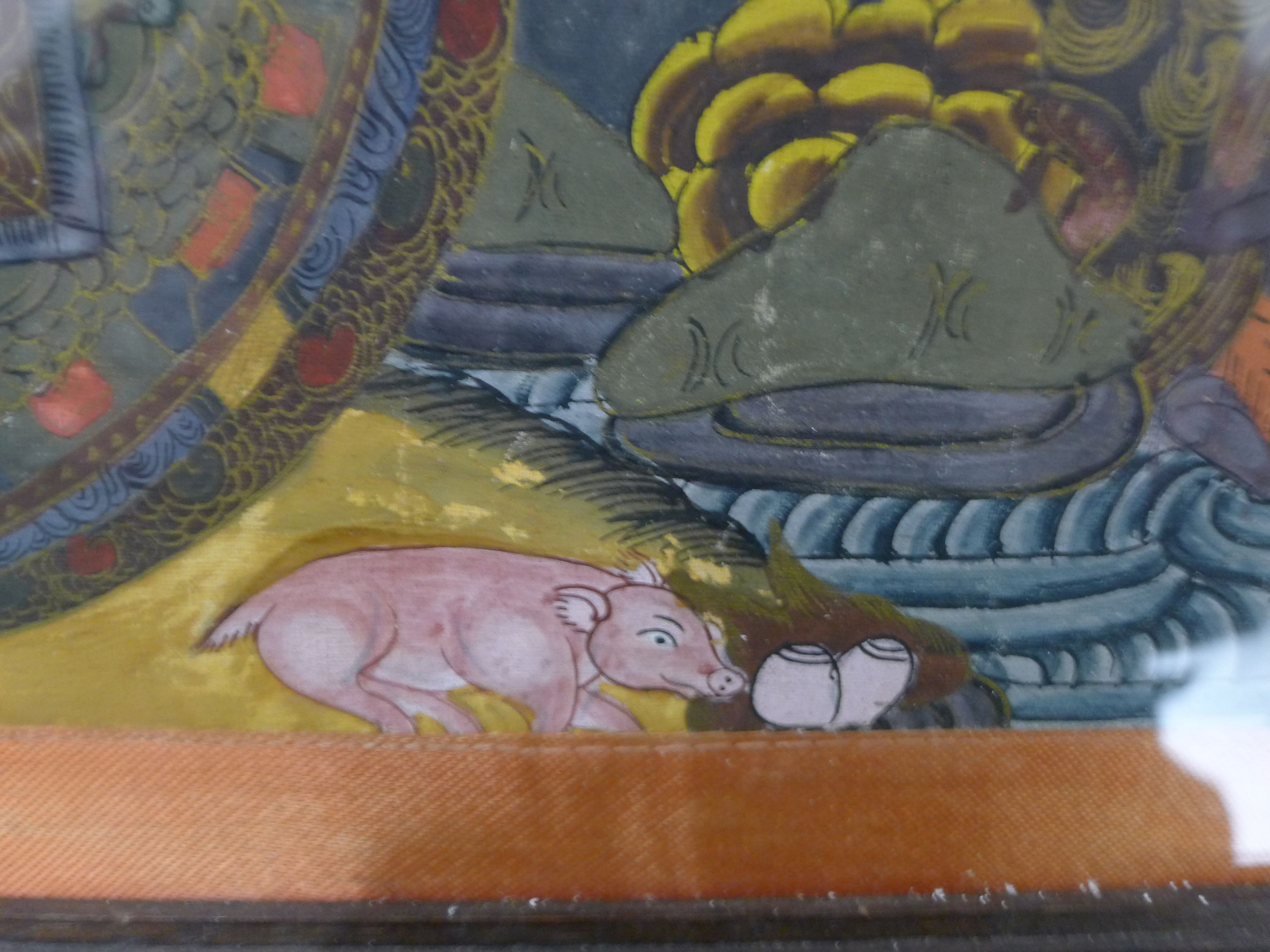 A painted antique Tibetan Buddhist painting (thanka) of deities, animals, reptiles etc. - Image 2 of 7