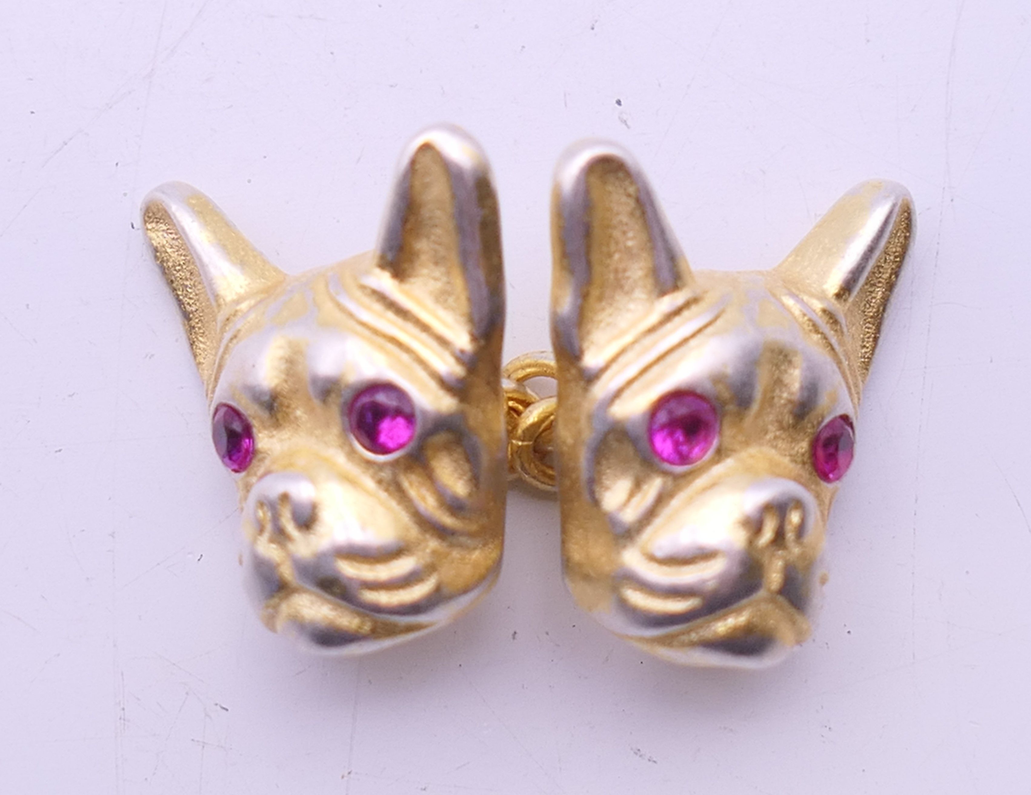A pair of silver gilt cufflinks formed as French bulldog heads bearing Russian marks. 1.5 cm high. - Image 2 of 3
