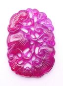 A Chinese pink ground pendant. 6.5 cm high.