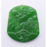 A Chinese apple green jade pendant with gold suspension loop. 5.5 cm high.