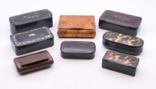 Eight 19th century snuff boxes. The largest 9.5 cm wide.