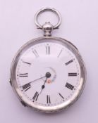 A 935 open faced silver cased pocket watch. 4 cm diameter.