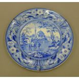 A 19th century Tchiurluk pattern blue and white Staffordshire dinner plate from the Ottoman Empire