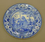 A 19th century Tchiurluk pattern blue and white Staffordshire dinner plate from the Ottoman Empire