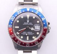 A gentleman's Rolex Oyster Perpetual GMT "Pepsi" Master wristwatch (with service/repair warranty