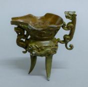 A Chinese bronze jue cup. 12.5 cm high.