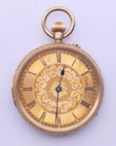 An 18 K gold cased pocket watch. 4 cm diameter. 49.6 grammes total weight.