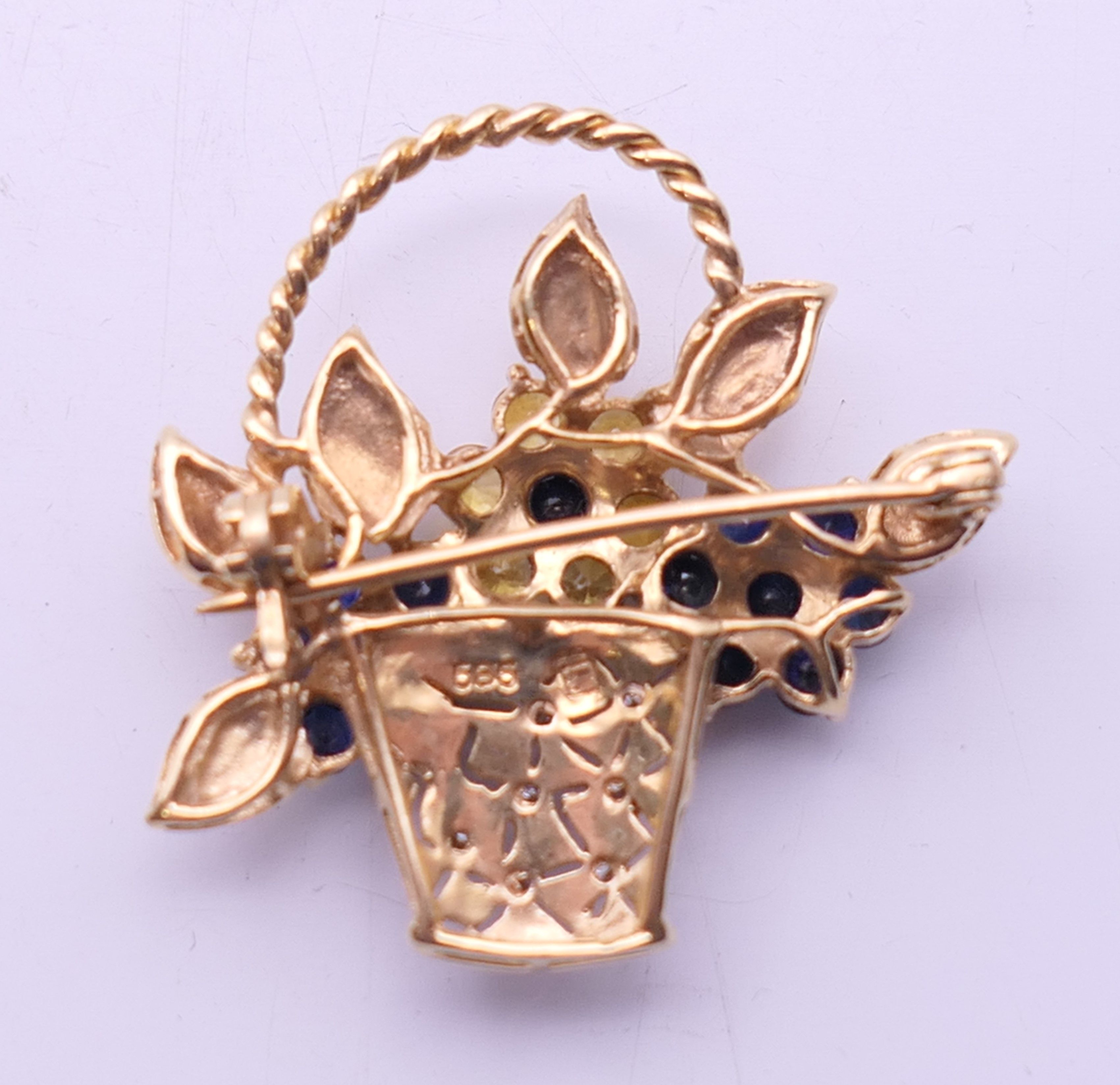 A 14 ct gold diamond, sapphire and citrine floral basket brooch. 3 cm high. 7. - Image 3 of 4