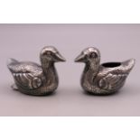 A pair of Chinese silver salt and pepper formed as ducks. 3.5 cm high.