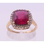 A 10 k gold synthetic ruby ring. Ring size N.