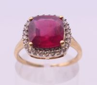 A 10 k gold synthetic ruby ring. Ring size N.