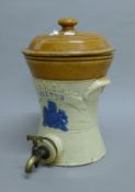 A Victorian stoneware water filter. 35 cm high.