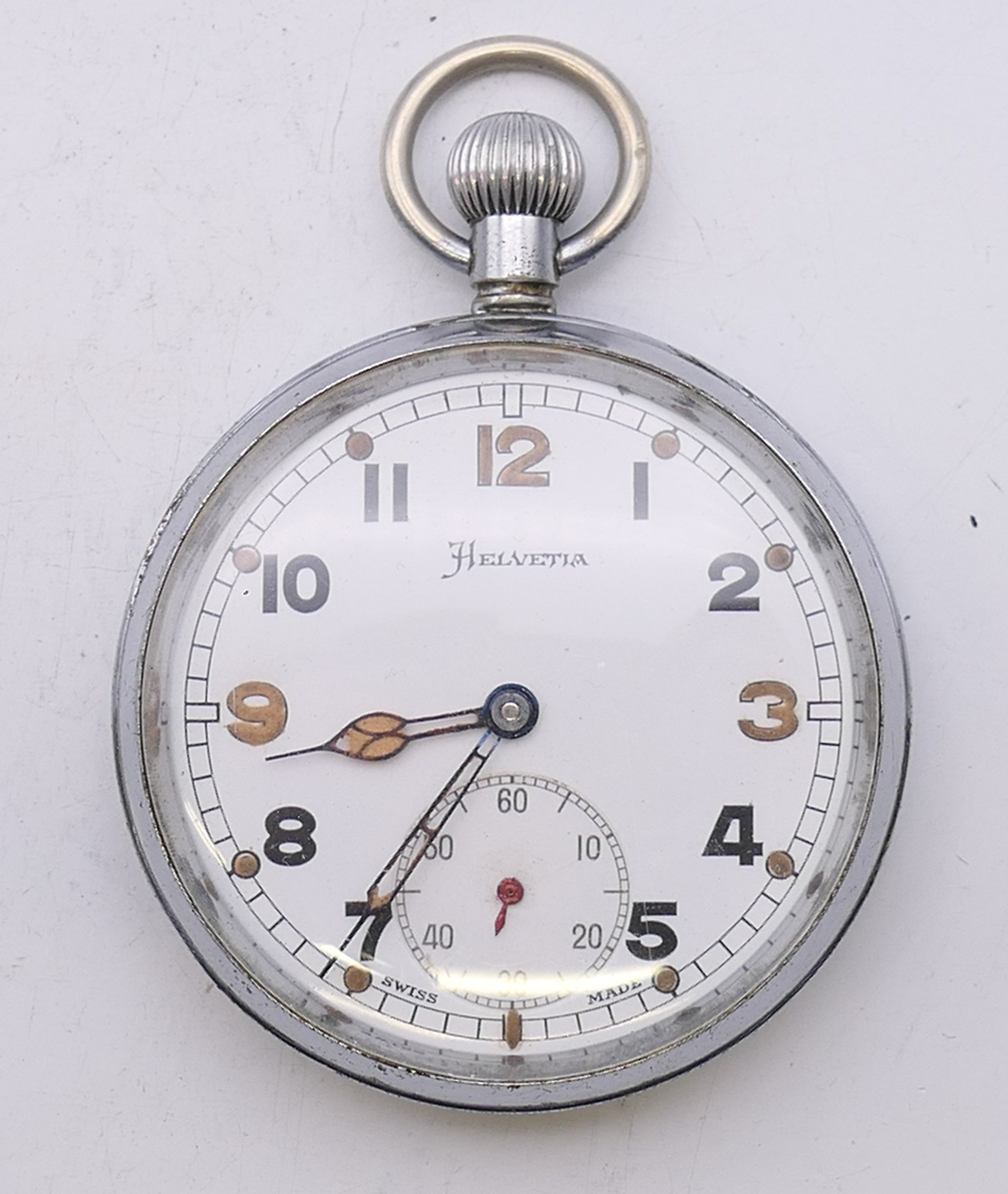 A Helvetia military pocket watch, the reverse stamped GS/TP P59849. 5 cm diameter.