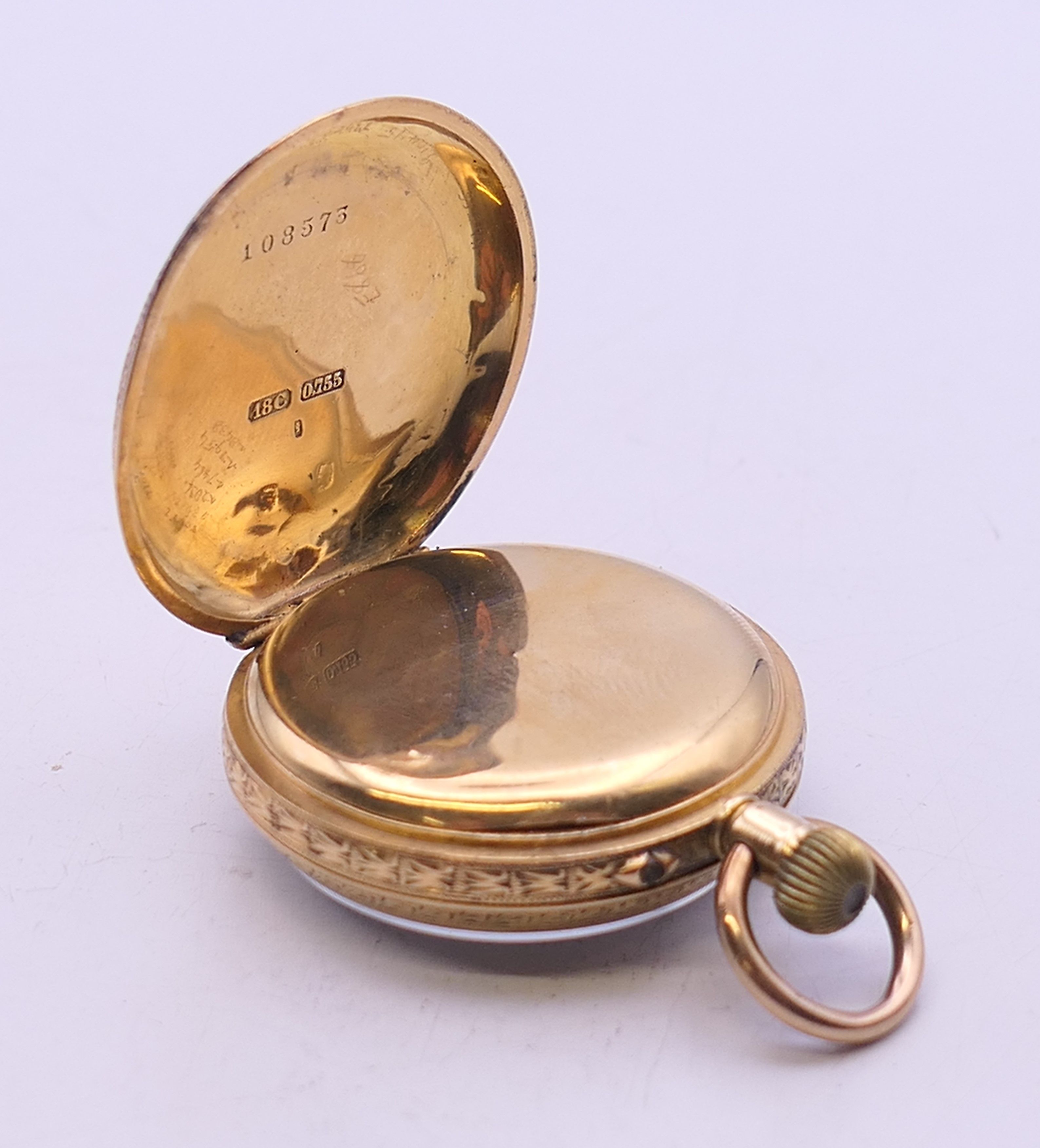 An 18 ct gold cased fob watch. 3.25 cm diameter. 31.7 grammes total weight. - Image 5 of 10