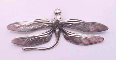 A silver dragonfly brooch. 9.5 cm wide.