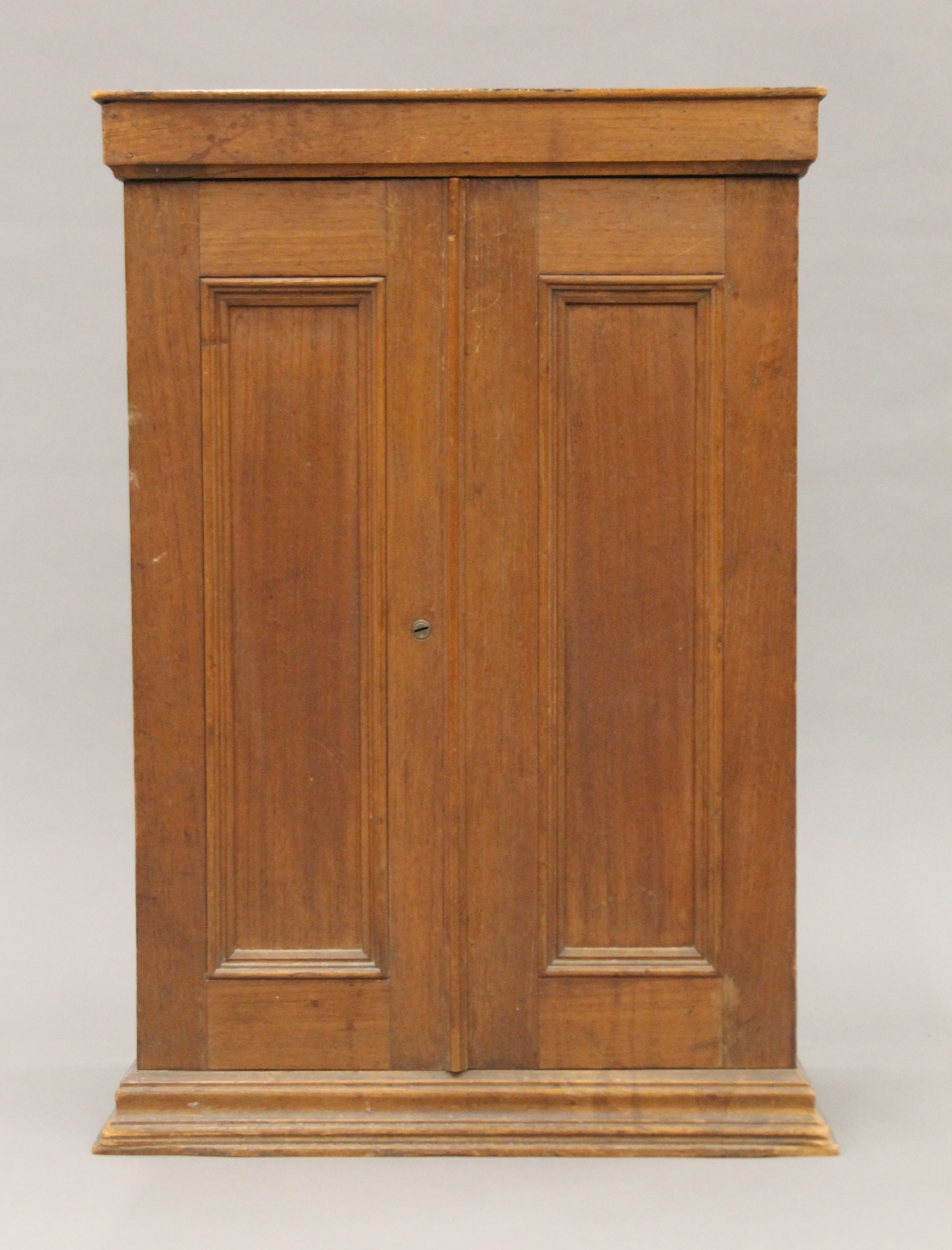 A late 19th century small walnut two-door cupboard. 45 cm wide x 66.5 cm high x 25.5 cm deep. - Image 2 of 8