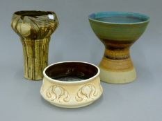 Three Studio pottery vases. The largest 25 cm high.