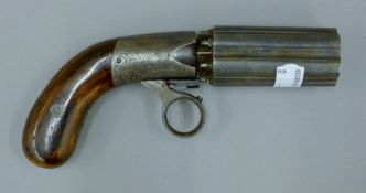 A 19th century 6 shot percussion pepper pot pistol marked J R Coopers patent. 19 cm long.