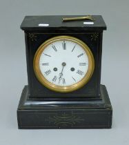 A Victorian black slate mantle clock. 28 cm high.