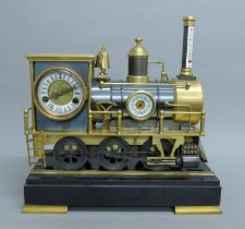 A large clock formed as a train. 48 cm long.