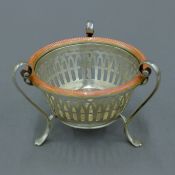 A Russian silver pierced bowl with pink enamel rim. 7.5 cm high. 134.6 grammes total weight.