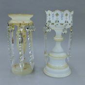 Two Victorian glass lustres and a quantity of spare lustres. The largest 34 cm high.