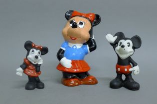 A pair of cast iron Mickey and Minnie Mouse money banks,