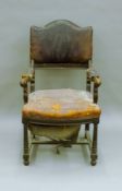 A 19th century mahogany leather upholstered open armchair with label to webbing for Elephant Brand,