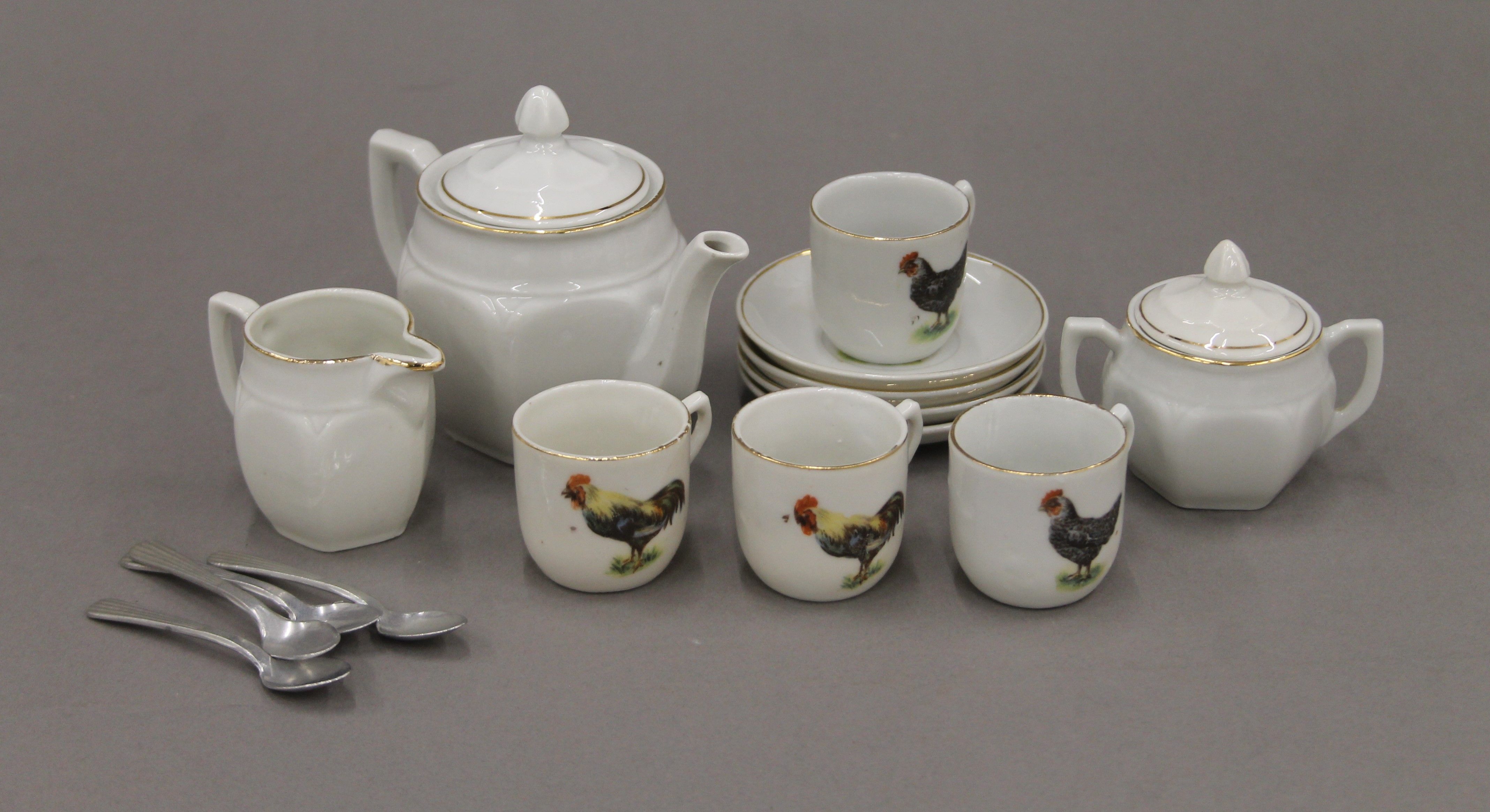 A child's tea set decorated with chickens and a quantity of small wooden animals. - Image 3 of 3