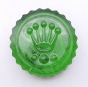 A boxed Rolex glass paperweight. 7 cm diameter.