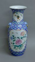 A 19th century Chinese porcelain vase decorated with birds. 63 cm high.