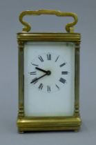 A late 19th/early 20th century brass cased carriage clock. 14 cm high.