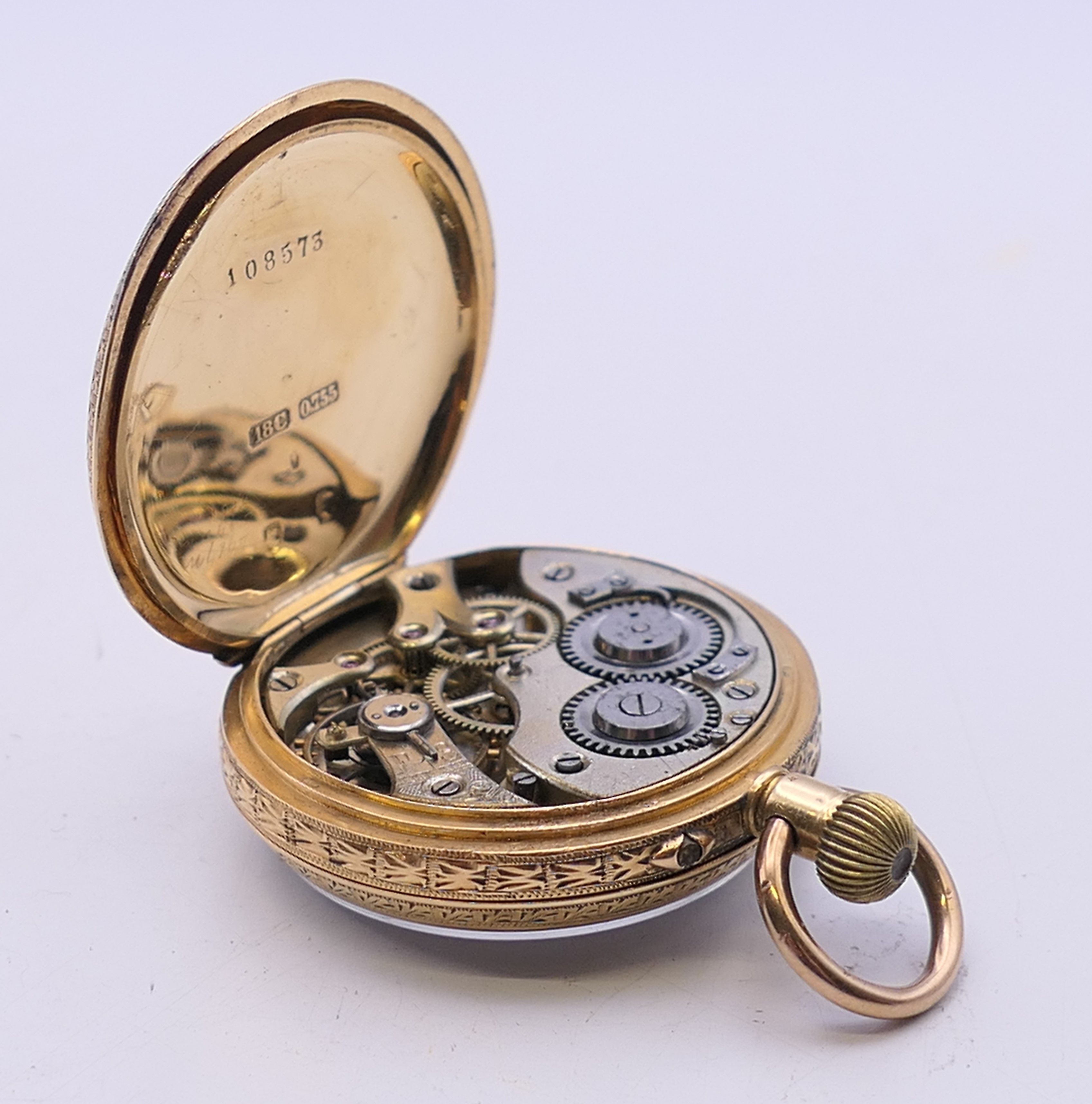 An 18 ct gold cased fob watch. 3.25 cm diameter. 31.7 grammes total weight. - Image 8 of 10